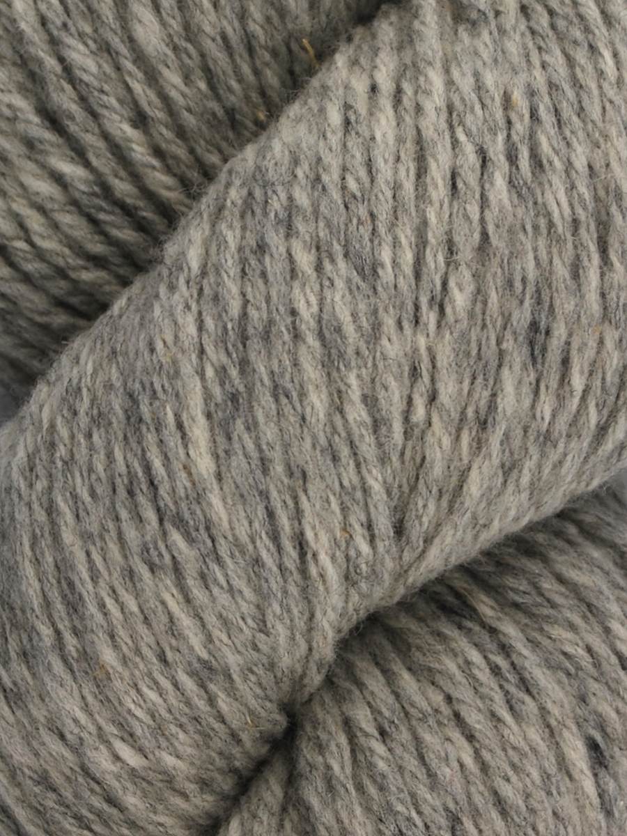 Santa Cruz Palladium is a lighter grey with flecks of white and mid grey throughout the skein. 