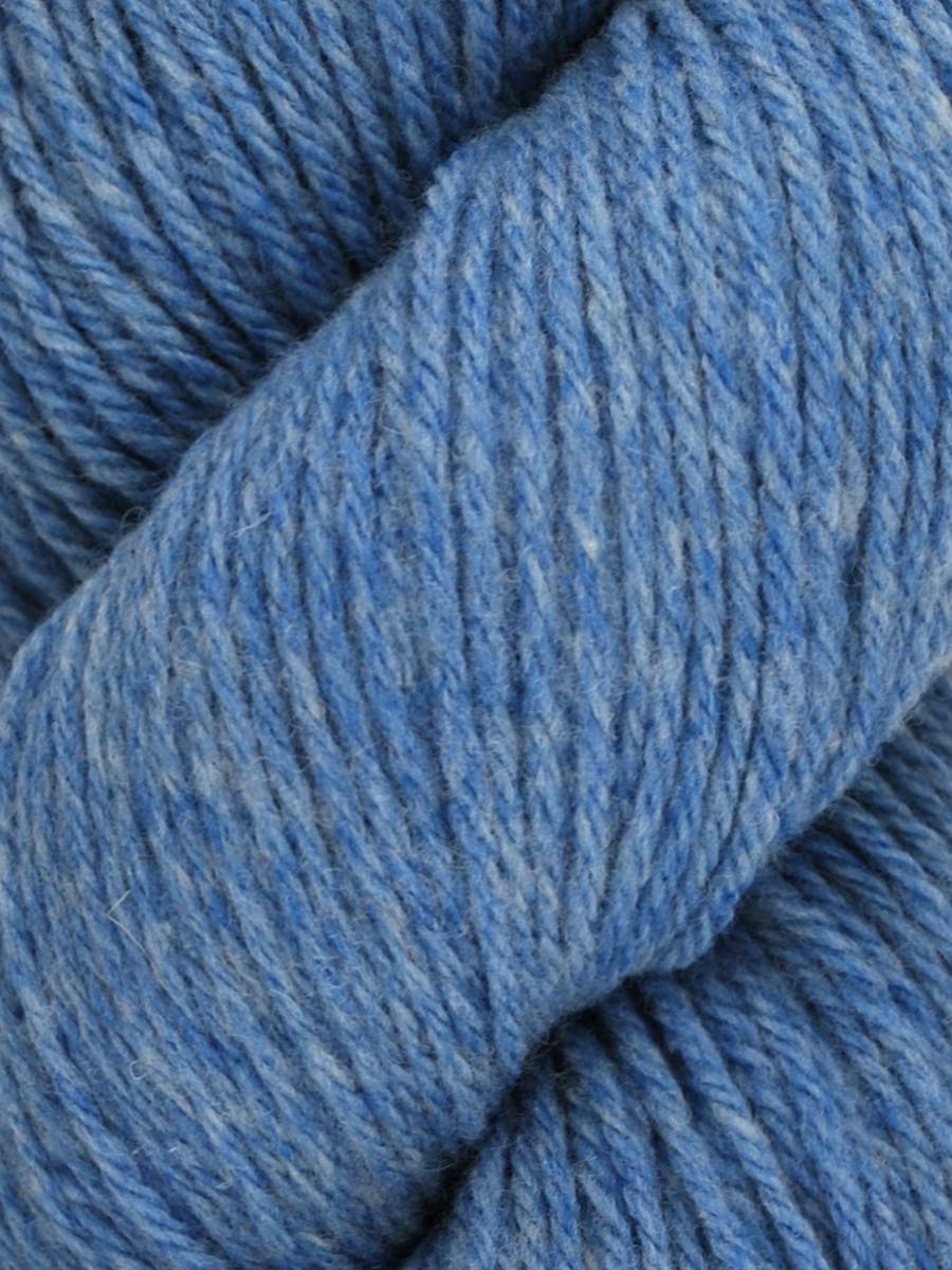 Cerulean leans towards the purple end of the blues, with a brighter blue and white flecks throughout the skein. 